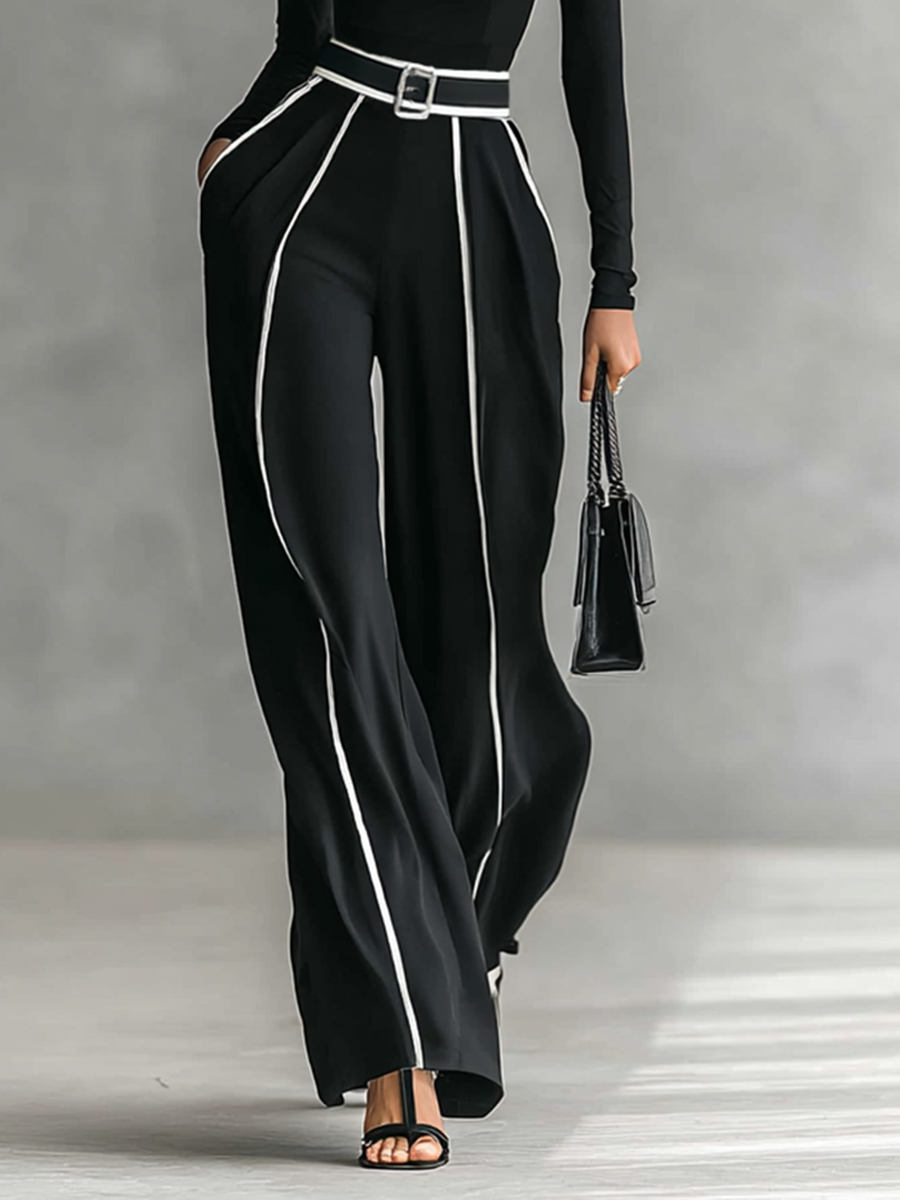 Two-piece women's set with a high-neck long-sleeve top, wide-leg pants, and belt