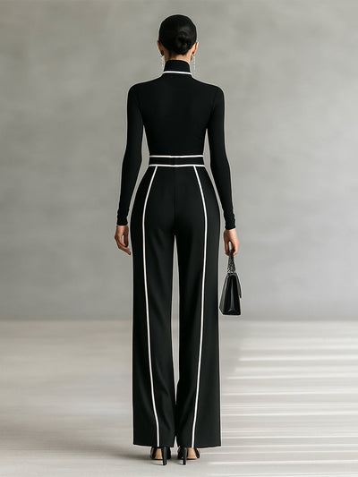 Two-piece women's set with a high-neck long-sleeve top, wide-leg pants, and belt